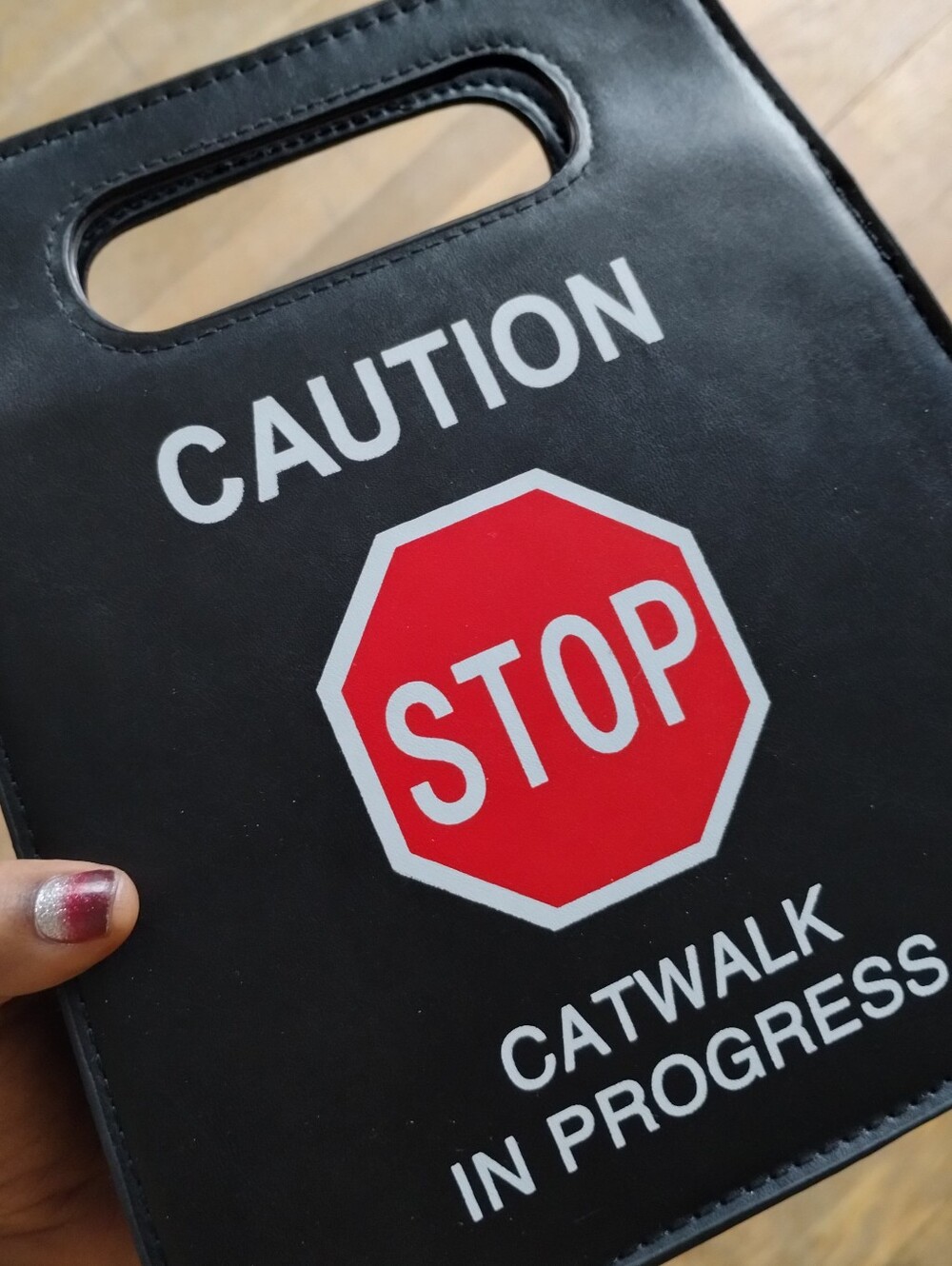 CAUTION Catwalk Triangle Top Handle/Crossbody Bag, Black, Zipper Closure, Stand